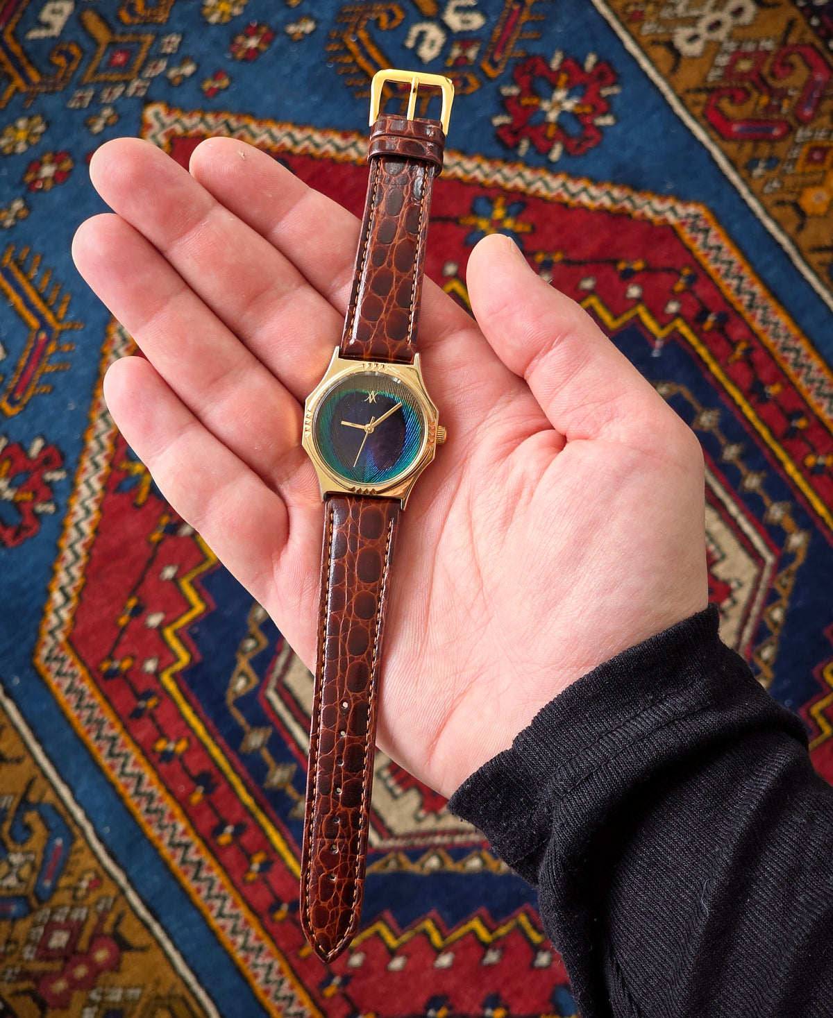 108. Peacock feather watch