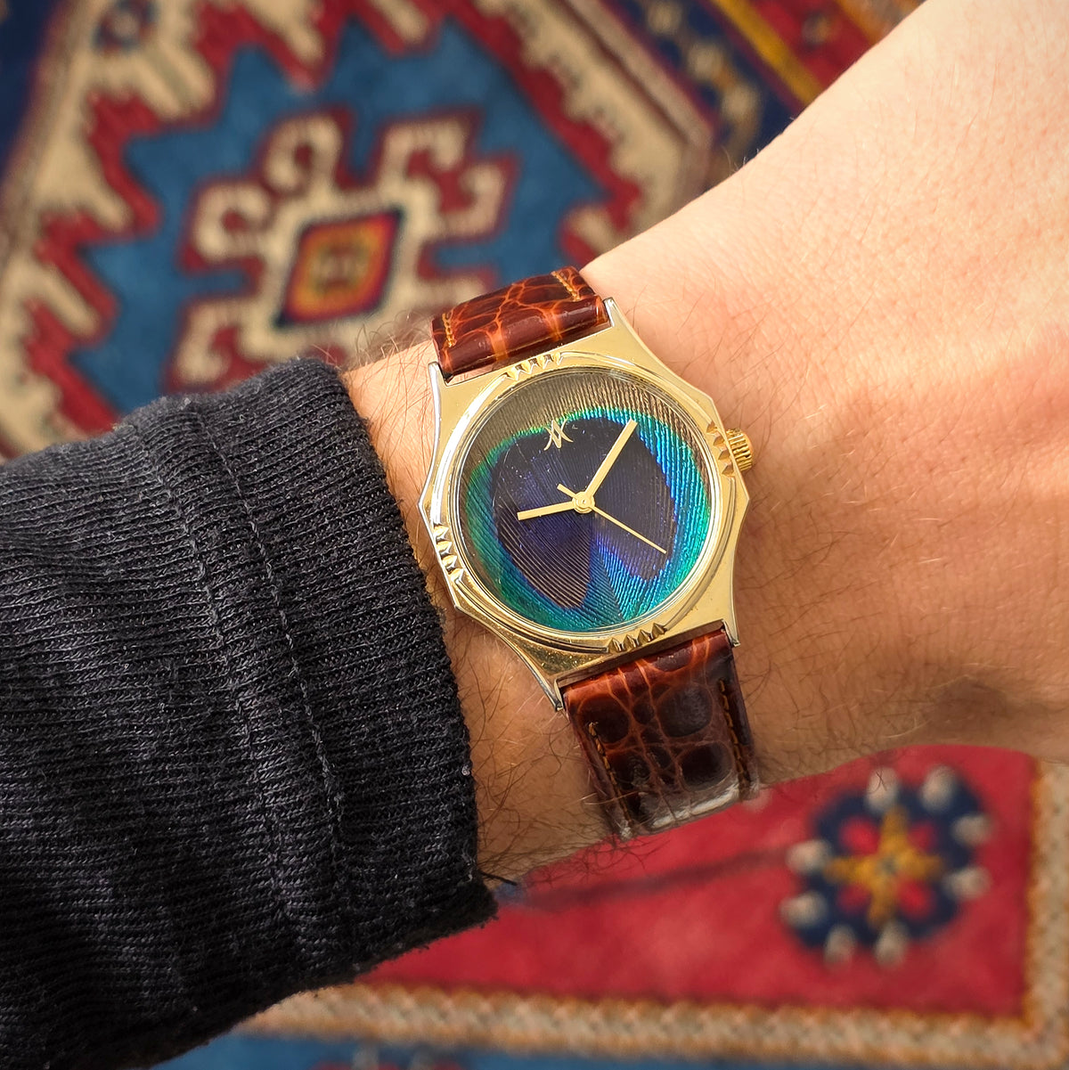 108. Peacock feather watch